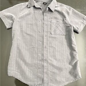 Grey short sleeve Tony Hawk button down collared shirt.